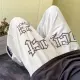 baggy pants for men fashion European and American hiphop pants high street straight-leg sweatpants retro drawstring pants. 