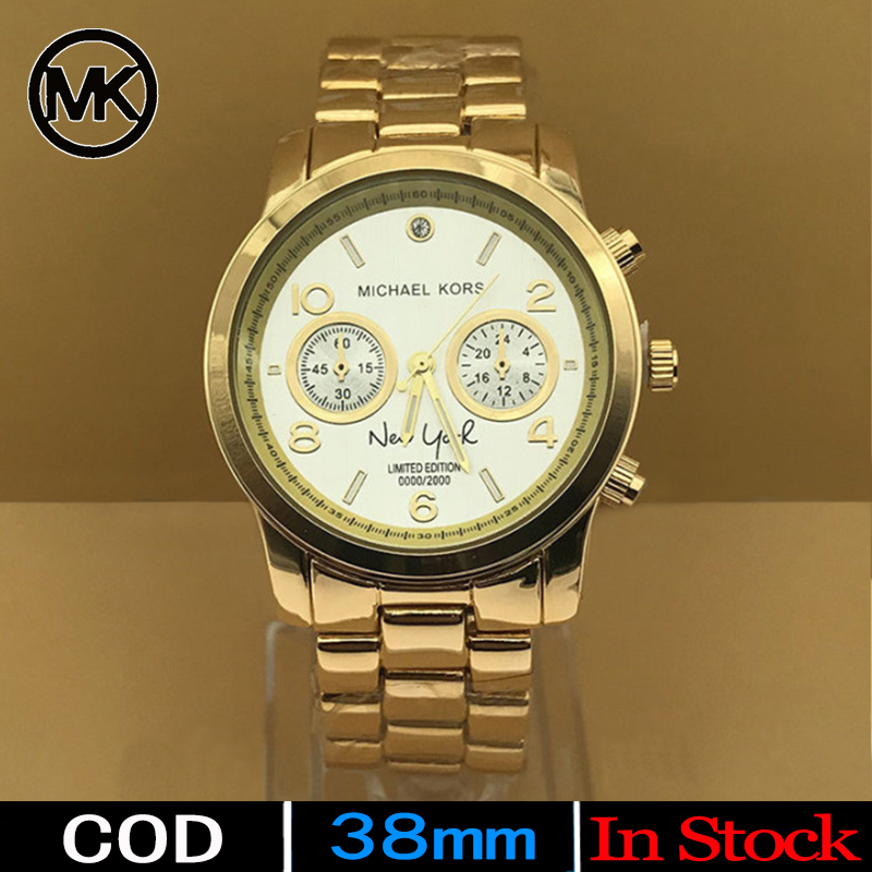 gold mk watch with diamonds